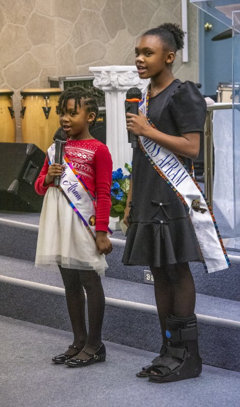 Makayla and Bryanna Harris, AFRAM Queens of 2024 and 2025, sing to open the ceremonies.
